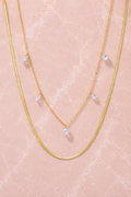 COLLIER INES